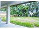 A view of the spacious backyard from a covered patio at 1331 19Th St, Orlando, FL 32805