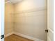 Spacious walk-in closet with installed shelving for organized storage and easy access to clothing at 1331 19Th St, Orlando, FL 32805