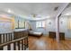 Bedroom with a rainbow wall mural, a ceiling fan, and hardwood floors at 1343 Charlotte St, Altamonte Springs, FL 32701