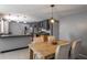 Well-lit eat-in kitchen features modern lighting, ample counter space, and a sleek design at 1343 Charlotte St, Altamonte Springs, FL 32701