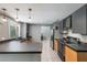 Open kitchen features stylish cabinets, stainless steel appliances, and ample counter space, ideal for cooking at 1343 Charlotte St, Altamonte Springs, FL 32701