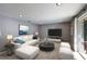 Bright living room with a white sofa, round marble table, and sliding glass doors to outdoor space at 1343 Charlotte St, Altamonte Springs, FL 32701