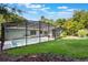 Enjoy outdoor living by the screened-in pool, with the house just steps away, on a well maintained lawn at 1343 Charlotte St, Altamonte Springs, FL 32701