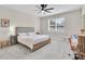 Cozy bedroom with plush carpeting, neutral tones, and ample natural light at 1425 Lone Wood Blvd, Orlando, FL 32828