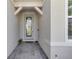 Inviting covered entryway featuring a decorative glass door at 1425 Lone Wood Blvd, Orlando, FL 32828