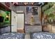 Themed bedroom featuring a Harry Potter mural, twin beds, and stone-style wallpaper for an immersive experience at 14501 Damai Ln, Orlando, FL 32821