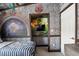 Fun bedroom with stone textured walls and Universal Epic Universe design elements at 14501 Damai Ln, Orlando, FL 32821