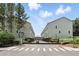 Gated community showing buildings on each side of the street at 14501 Damai Ln, Orlando, FL 32821