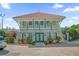 Community center building showcasing beautiful architecture, landscaping, and well-maintained surroundings at 14513 Damai Ln, Orlando, FL 32821