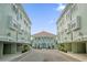 Community center building showcasing beautiful architecture, landscaping, and well-maintained surroundings at 14513 Damai Ln, Orlando, FL 32821