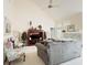 Spacious living room with vaulted ceiling, comfortable seating, and elegant decor, creating a welcoming atmosphere at 1486 Farrindon Cir, Lake Mary, FL 32746