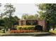 Community sign for The Athletic Club at Heathrow with lush landscaping at 1486 Farrindon Cir, Lake Mary, FL 32746