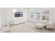 Bright and spacious living room features a modern interior design and plenty of natural light at 15444 Lebeau Loop, Winter Garden, FL 34787