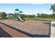 Community playground with a slide and play structures at 15444 Lebeau Loop, Winter Garden, FL 34787