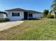 Charming single-story home with a well-maintained lawn and inviting curb appeal at 1750 Mitten Ter, Deltona, FL 32738