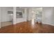 Open floorplan shows hardwood floors, kitchen, and staircase at 181 Longview Ave, Kissimmee, FL 34747