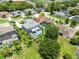 Aerial view showcasing a residential neighborhood with mature trees and private backyard swimming pools at 2214 Westbourne Dr, Oviedo, FL 32765