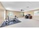 Bright bonus room with arched windows, perfect for an office or fitness area at 2214 Westbourne Dr, Oviedo, FL 32765