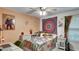 Colorful bedroom with unique decor and natural light at 245 Via Siena Ln, Lake Mary, FL 32746