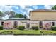 Community entrance sign with water features, lush landscaping and manicured hedges at 245 Via Siena Ln, Lake Mary, FL 32746