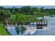 Community pier and lakeside gazebo overlooking the water, ideal for relaxing and enjoying scenic views at 245 Via Siena Ln, Lake Mary, FL 32746