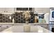Close up view of a kitchen showcasing modern countertop decor and stylish hexagon backsplash tiles at 245 Via Siena Ln, Lake Mary, FL 32746