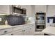 Well-equipped kitchen featuring modern stainless steel appliances and ample counter space at 245 Via Siena Ln, Lake Mary, FL 32746