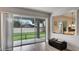 Bright living room with sliding glass doors to the patio and backyard view at 245 Via Siena Ln, Lake Mary, FL 32746