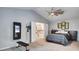 Large main bedroom features workout equipment and access to upstairs hallway at 245 Via Siena Ln, Lake Mary, FL 32746