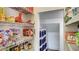 Walk-in pantry with built in storage shelving at 245 Via Siena Ln, Lake Mary, FL 32746