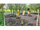 A community playground with slides, climbing structures, a climbing wall, and a seesaw at 245 Via Siena Ln, Lake Mary, FL 32746