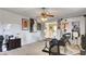 Open concept studio features ample natural light, a ceiling fan, and neutral walls and floors at 245 Via Siena Ln, Lake Mary, FL 32746