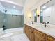 Charming bathroom offers a double sink, vanity, and tiled shower and bath at 2520 Chanute Trl, Maitland, FL 32751