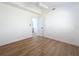 Bedroom features wood floors, a window, and modern touches at 2520 Chanute Trl, Maitland, FL 32751