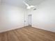 Bedroom features wood floors, a window, and modern touches at 2520 Chanute Trl, Maitland, FL 32751