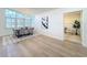 Bright dining room with large windows, modern chandelier, and seating for six at 2520 Chanute Trl, Maitland, FL 32751
