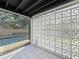 Stylish outdoor area featuring a decorative breeze block wall and views of the shimmering pool at 2520 Chanute Trl, Maitland, FL 32751