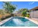 Refreshing swimming pool with clear blue water, surrounded by a brick patio and landscaped yard at 2520 Chanute Trl, Maitland, FL 32751