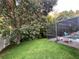 Well-manicured yard with screened pool and outdoor seating at 2643 Aloma Oaks Dr, Oviedo, FL 32765