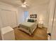 Comfortable bedroom featuring a queen bed and ample closet space at 2643 Aloma Oaks Dr, Oviedo, FL 32765