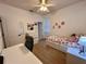 Functional bedroom with closet and well-lit desk area at 2643 Aloma Oaks Dr, Oviedo, FL 32765