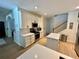 Updated kitchen features stainless steel appliances, white cabinetry, and a modern island at 2643 Aloma Oaks Dr, Oviedo, FL 32765