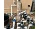 Pool filter and other maintenance equipment along exterior of home at 2643 Aloma Oaks Dr, Oviedo, FL 32765