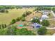 Aerial view showing a home with a very large yard bordered by agriculture at 2771 Ne 66Th St, Ocala, FL 34479