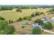 Overhead view of a home in a neighborhood interspersed among mature trees at 2771 Ne 66Th St, Ocala, FL 34479
