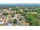 Neighborhood aerial view showcasing homes with large yards in a lush, wooded community at 2771 Ne 66Th St, Ocala, FL 34479