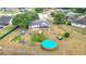 Bird's eye view of the property highlighting the backyard, above-ground pool, and established landscaping at 2771 Ne 66Th St, Ocala, FL 34479
