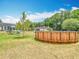 Spacious backyard featuring an above-ground pool and plenty of room for outdoor activities at 2771 Ne 66Th St, Ocala, FL 34479