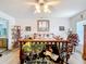 Well-lit bedroom with bright walls, warm wood furniture, and cozy accents, creating a welcoming space at 2771 Ne 66Th St, Ocala, FL 34479