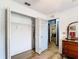 Walk-in closet with wood floors and shelving at 2771 Ne 66Th St, Ocala, FL 34479
